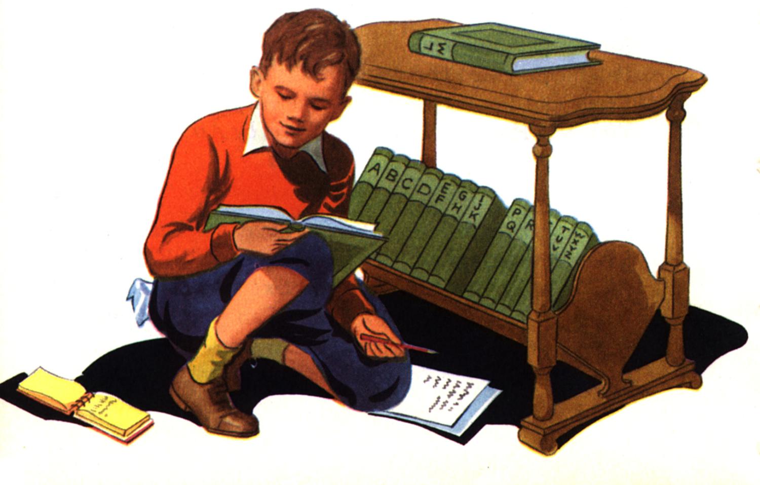 Boy reading encyclopedia