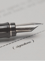 Pen poised over document